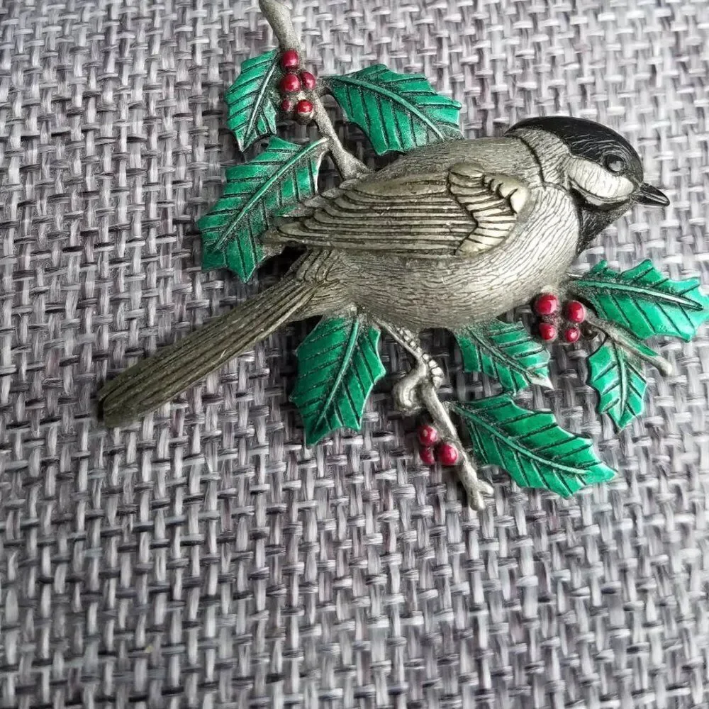 Vintage signed J J Jonette Bird on Holy Brooch
